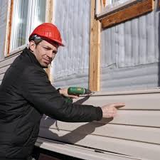 Affordable siding repair and maintenance services in Ellis, KS